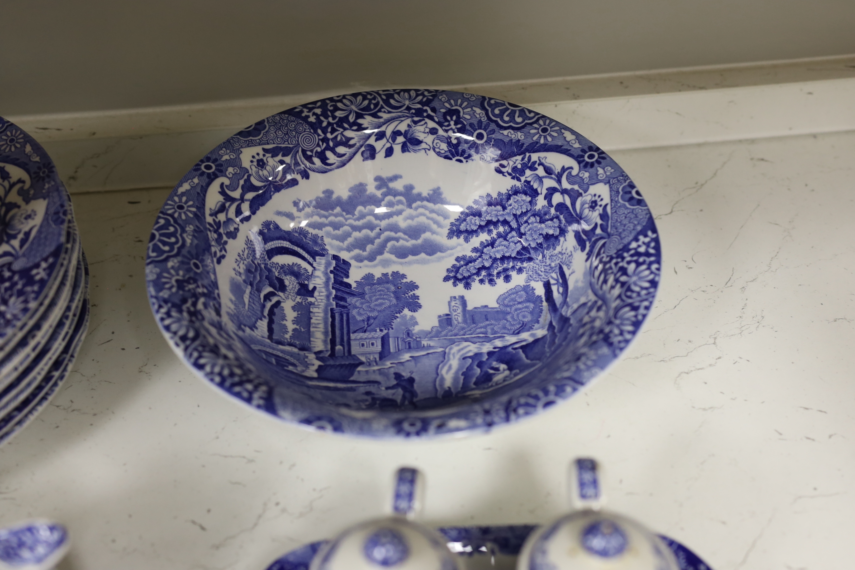 A Spode Italian part breakfast set to include jam and honey pots and covers mugs dishes etc